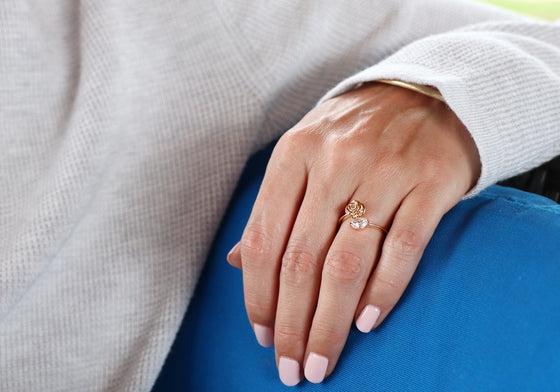 Ring with a rose and an oval stone