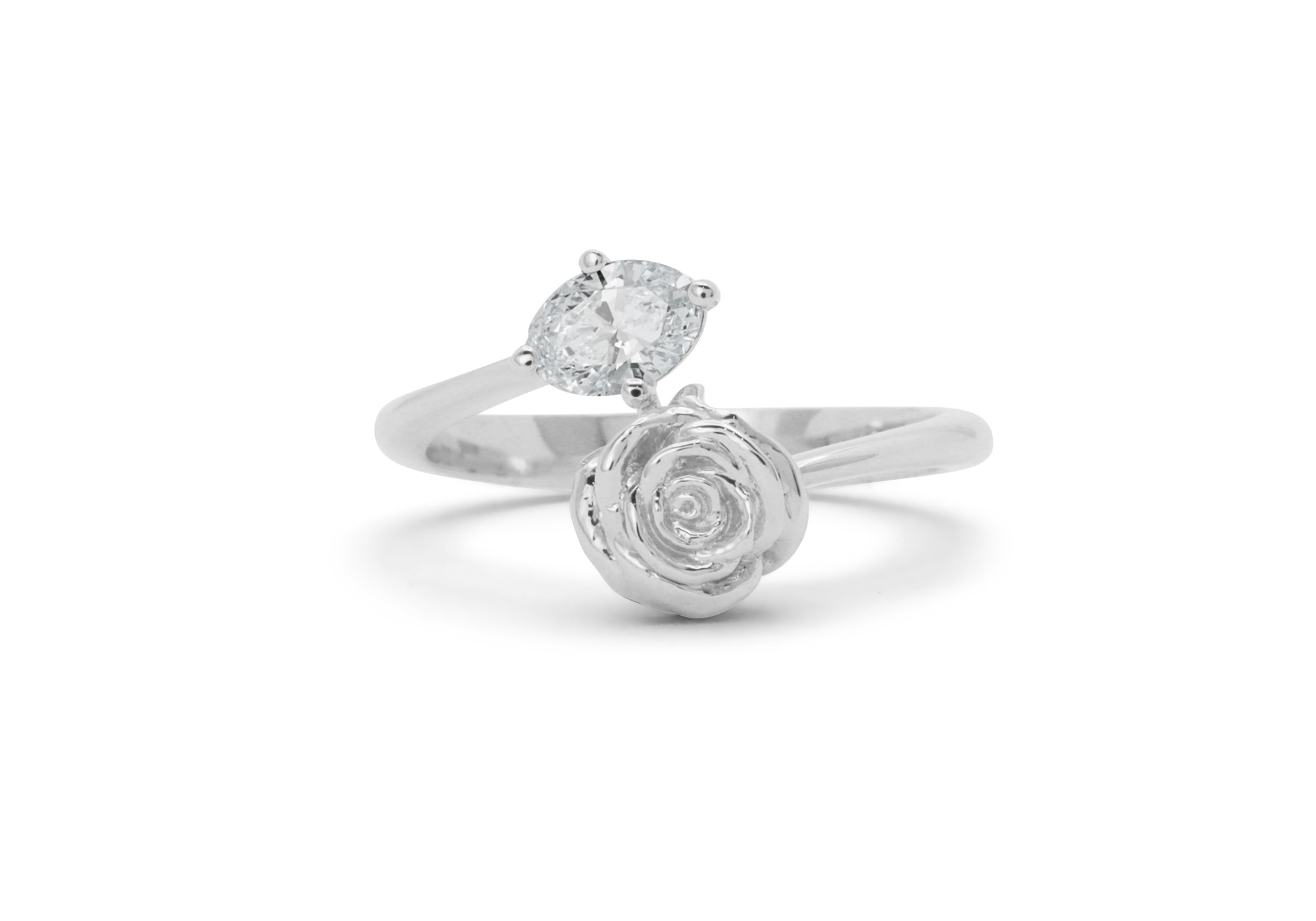 Romantic ring with a rose and a moissanite