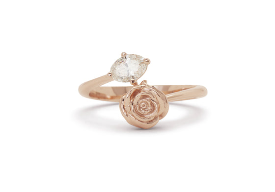 Ring with a rose and an oval stone