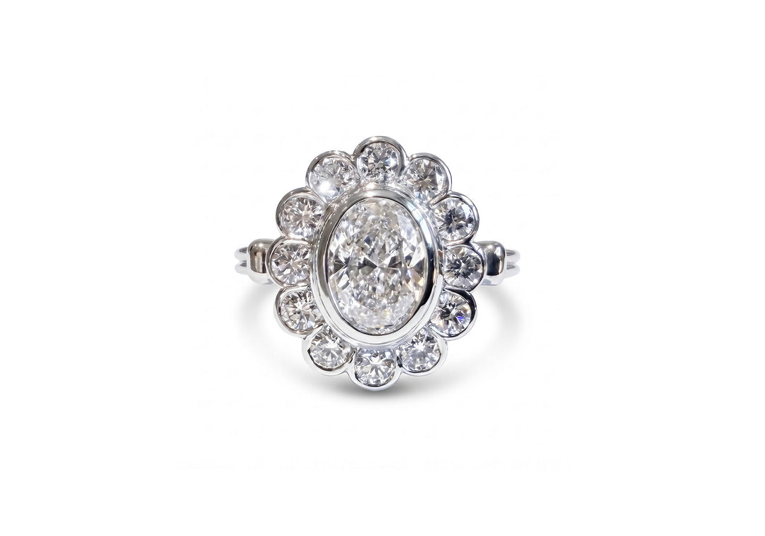 Bague de fiançailles marguerite avec diamants de laboratoire ovale et or blanc