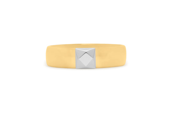 Yellow gold band with gold made faceted stone.