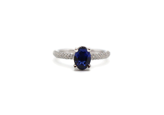 Platinum ring with sapphire and diamonds