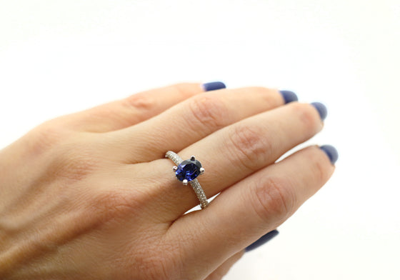 Platinum ring with sapphire and diamonds