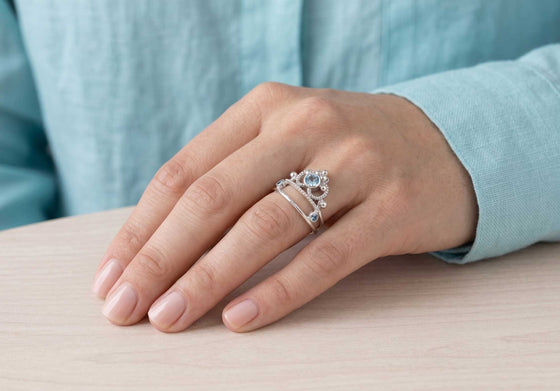 Crown ring and topaz