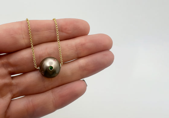 Tahitian pearl with gemstones